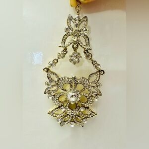 Elegant Gold and Silver Floral Pendant